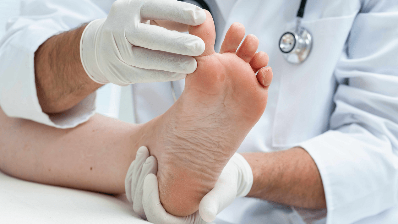 examination of the skin of the legs at an appointment with a specialist